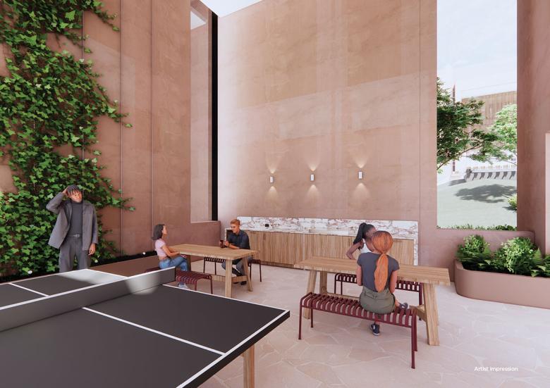 Artistic render of a games room featuring a table tennis table surrounded by bench seating and students in the new UQ residences