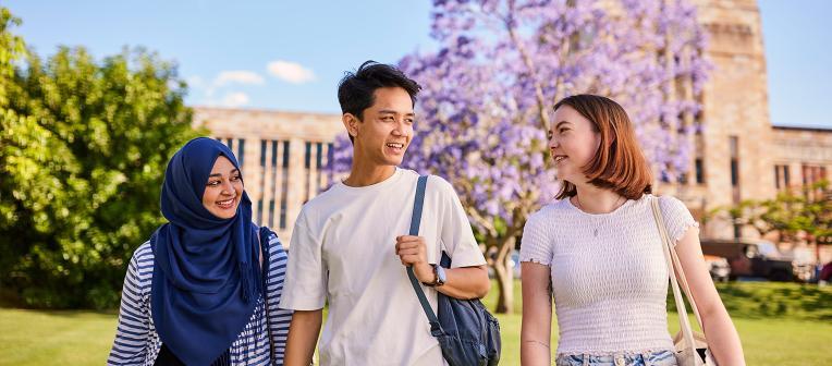 Students walking outside the Forgan Smith Building. 