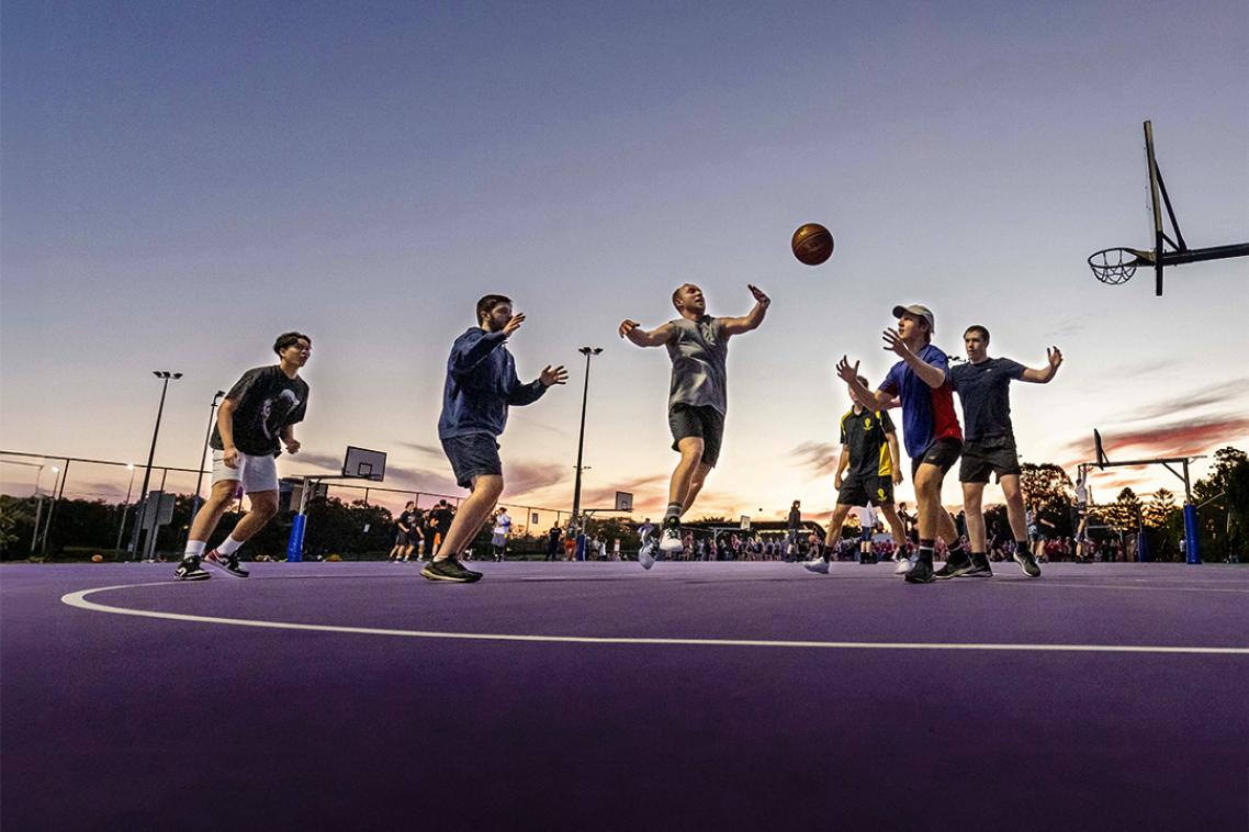 Students playing basketball