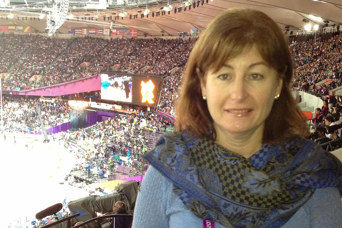 Sports journalist Louise Evans at a sporting stadium
