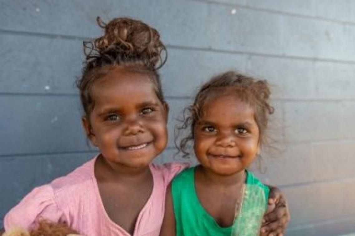 Two Indigenous girls smiling