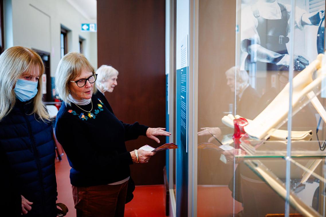Visitors viewing a museum exhibition