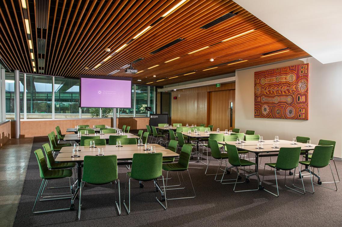 An interior view of the Terrace Room, showing workshop-style table seating