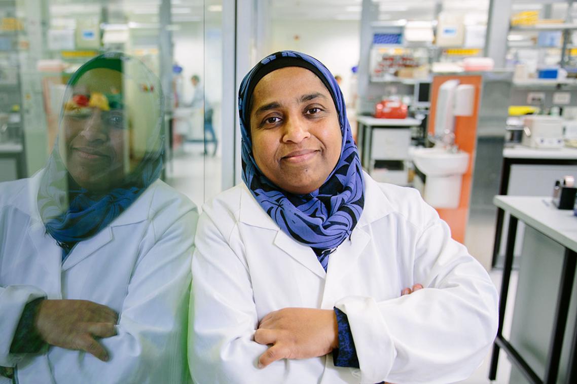 Confident researcher staring into camera