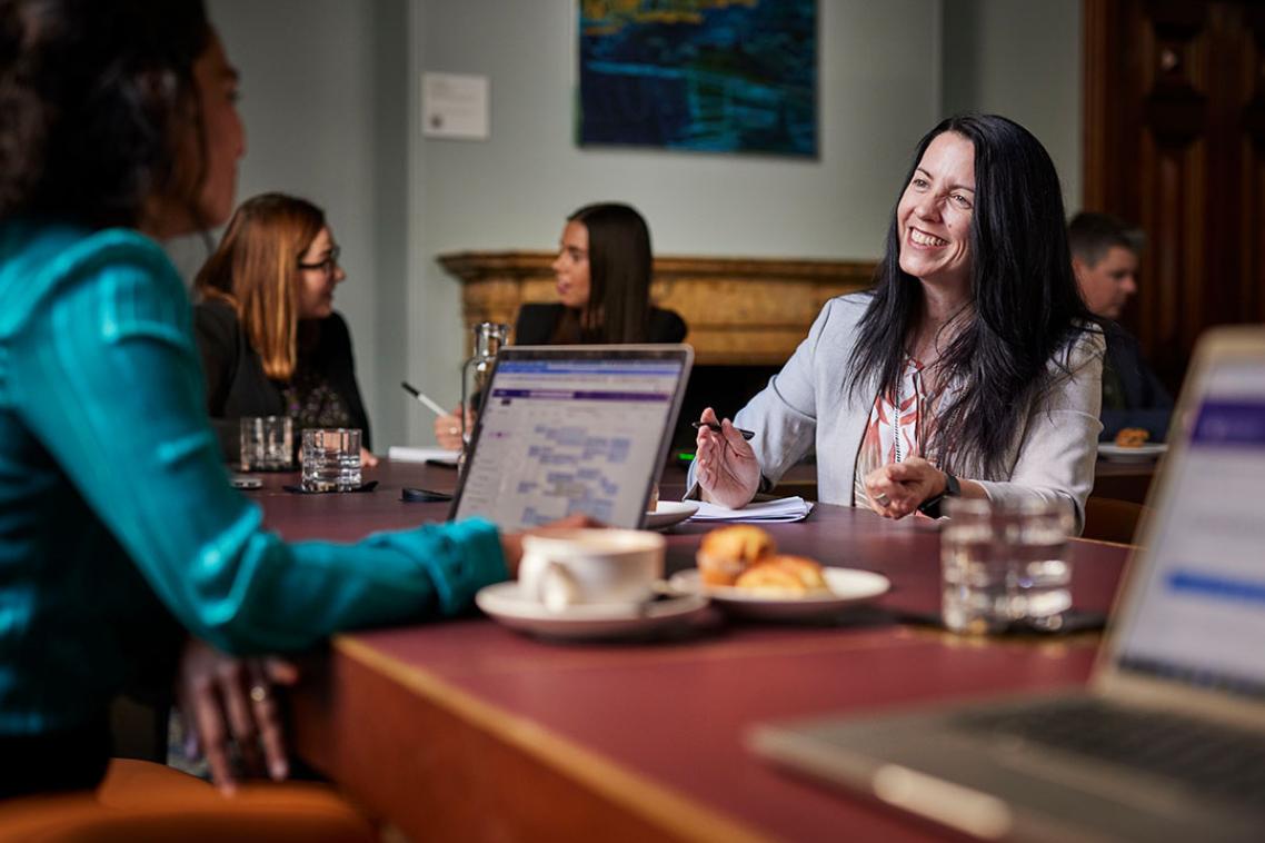 Academic meeting with a partner to discuss research. 